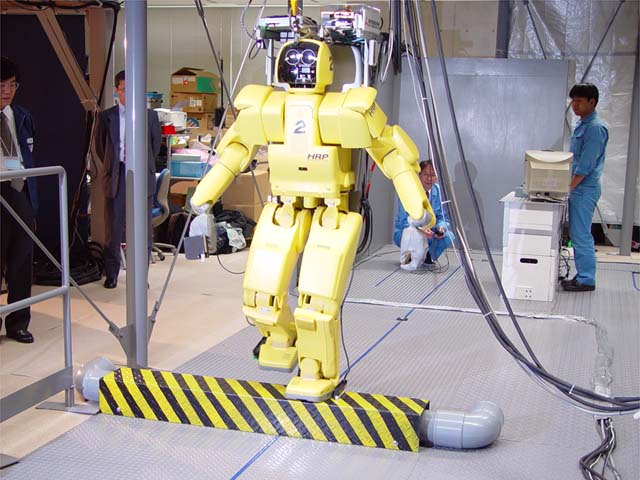 HRP-1S robot stepping over obstacle